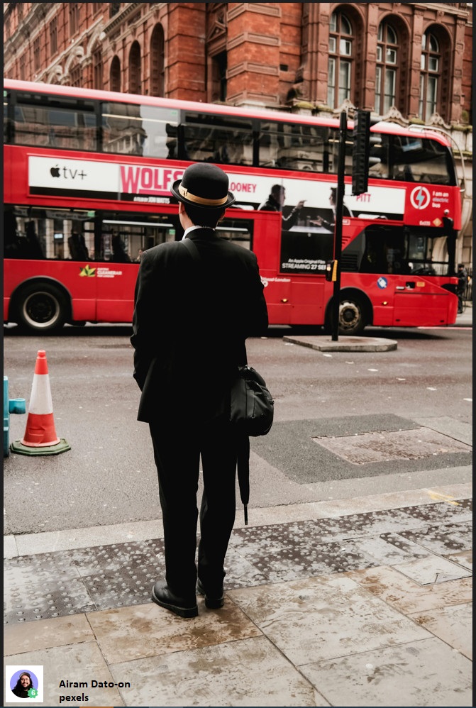 Englishman with bowler hat and umbrella - Airam Dato-on, pexels